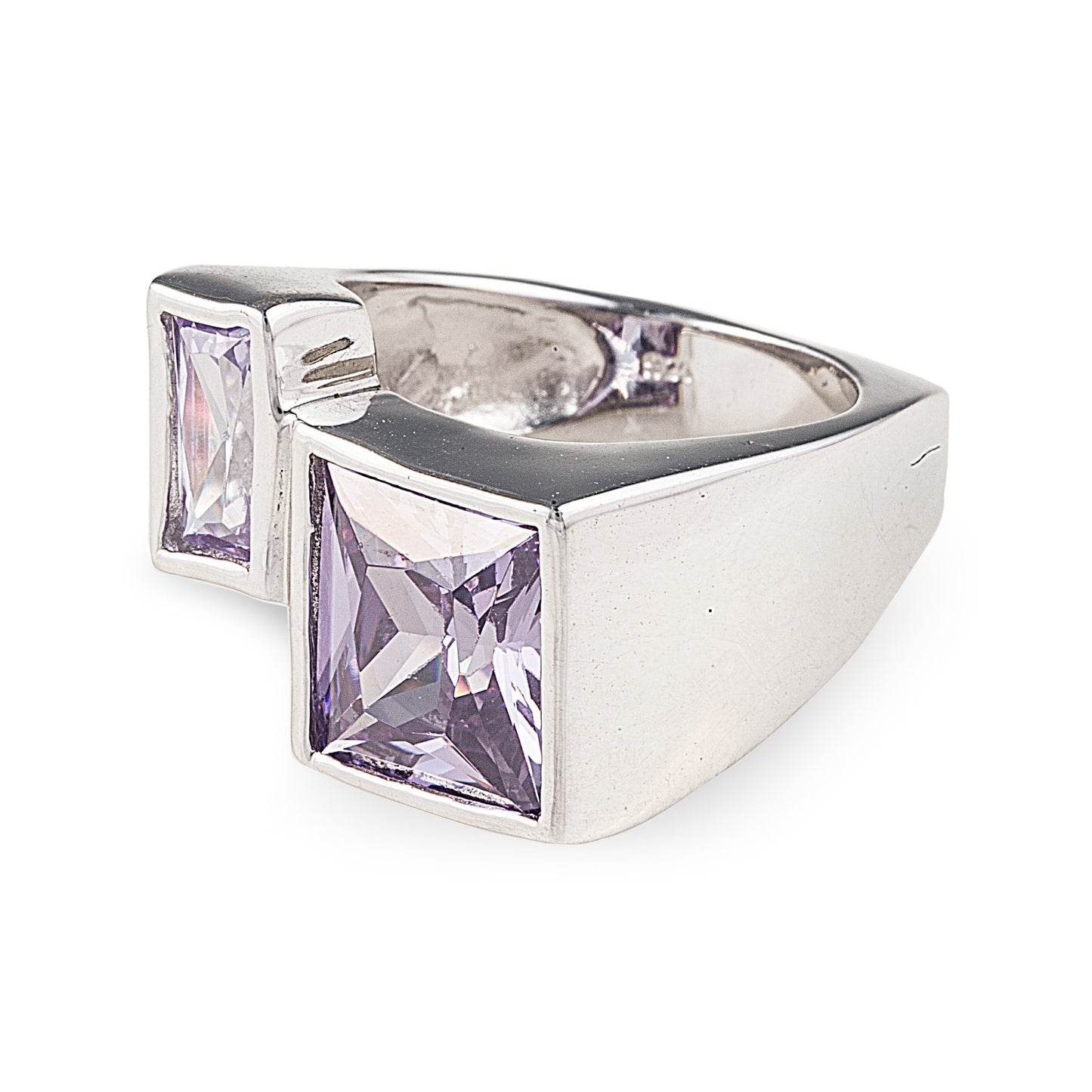 Amalfi Ring in 925 Sterling Silver featuring two purple princess cut stones set into a modern asymmetric design. Worldwide shipping. Jewellery by Bellagio & Co.