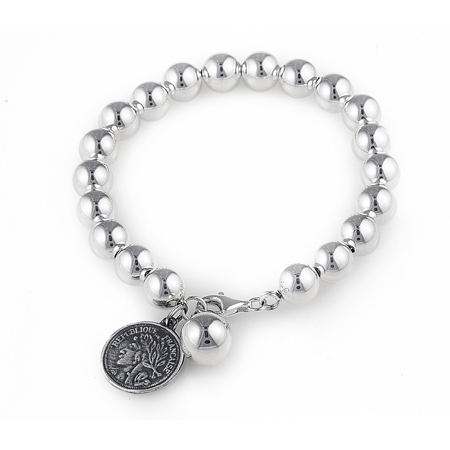 The enchanting Contessa Bracelet with Ball & Coin is crafted of 10mm 925 sterling silver beads threaded onto a sturdy chain for beauties who want a modern take on the classic pearl bracelet. Worldwide shipping.