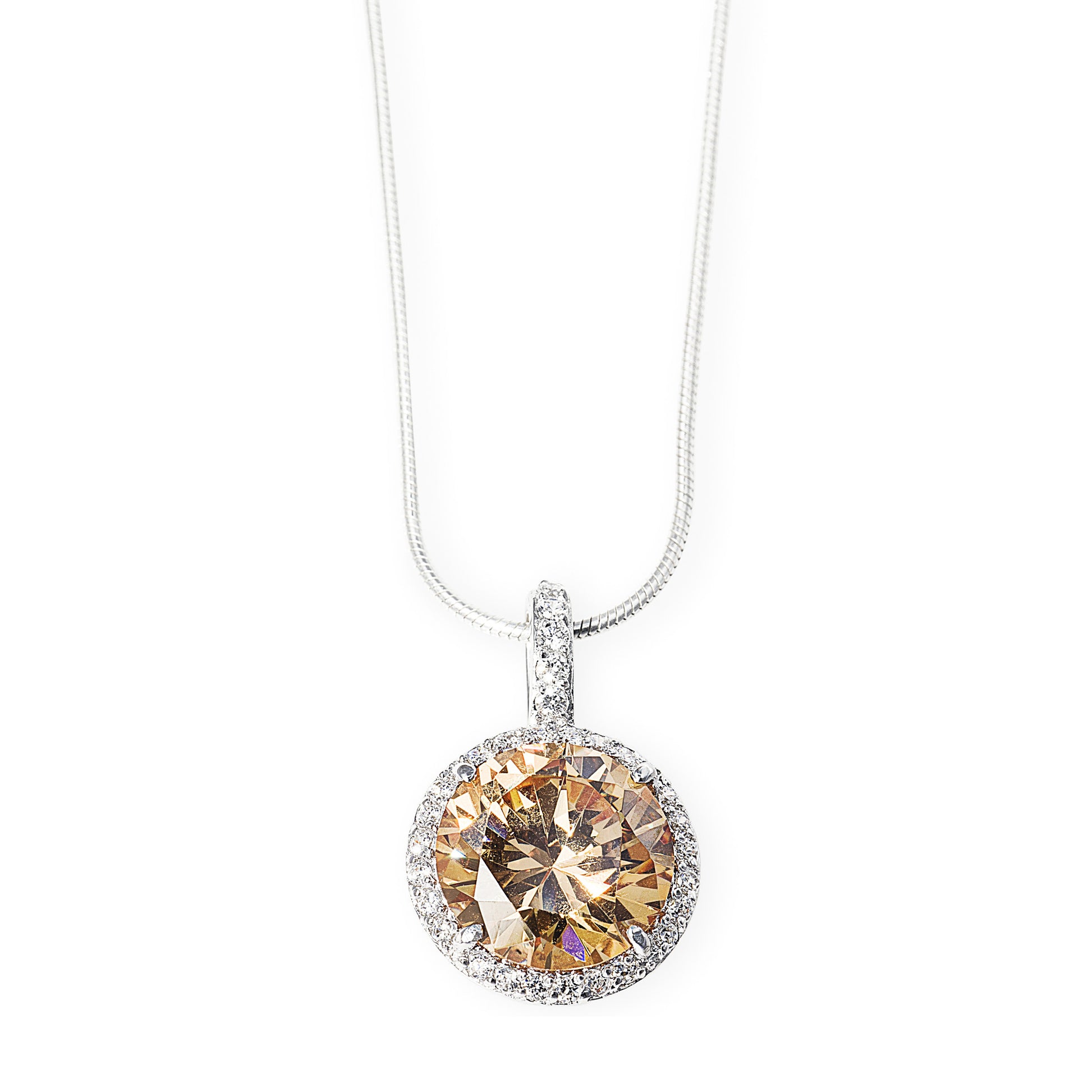 The Empire Necklace is a hanging antique style 925 sterling silver necklace featuring a large regal champagne cubic zirconia stone. Worldwide shipping. 