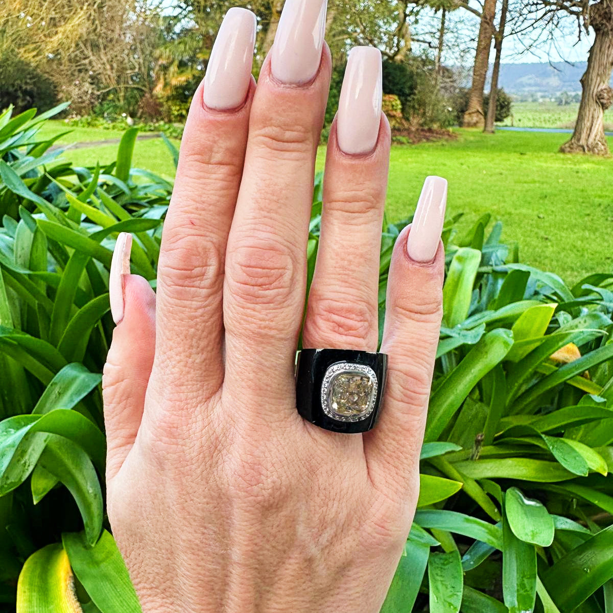 The Miami at Night Ring in 925 Sterling Silver features a highly polished black onyx backdrop that holds a large 4-carat princess-cut cubic zirconia stone surrounded by micro cubic zirconia stones. Attention-grabbing and big on bling. Worldwide Shipping + FREE shipping Australia for this ring.