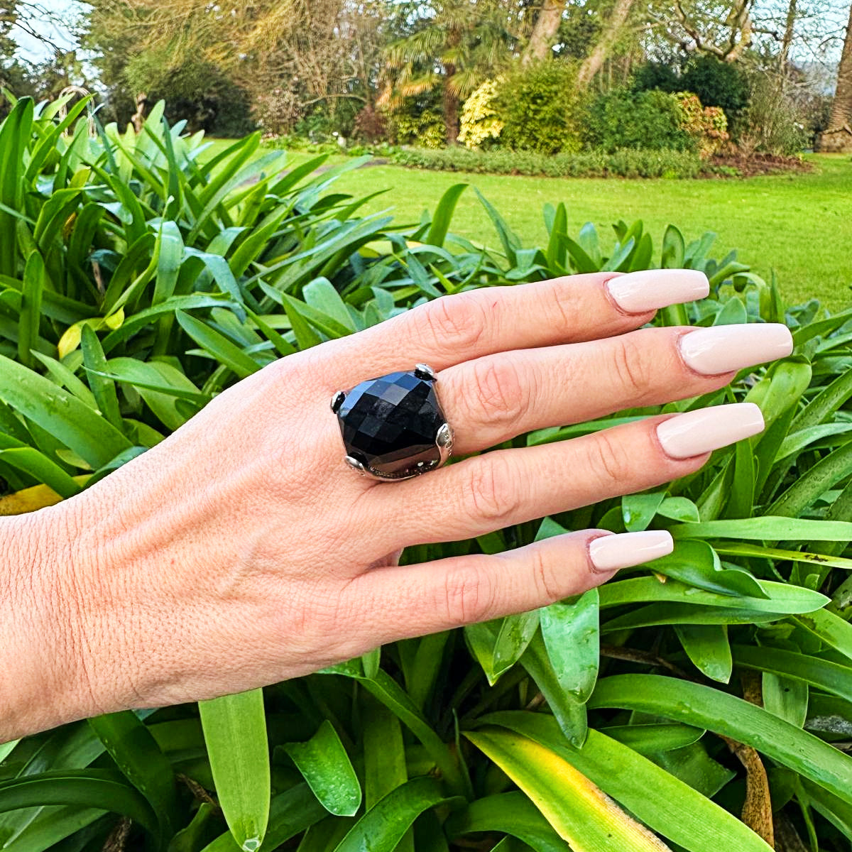 The Beyonce Ring is an attention-stealing facet-cut Black Onyx nugget held by 925 sterling silver claws which contain randomly placed cubic zirconia stones. This beauty is a real show-stopper. Worldwide Shipping. Jewellery by Bellagio & Co.
