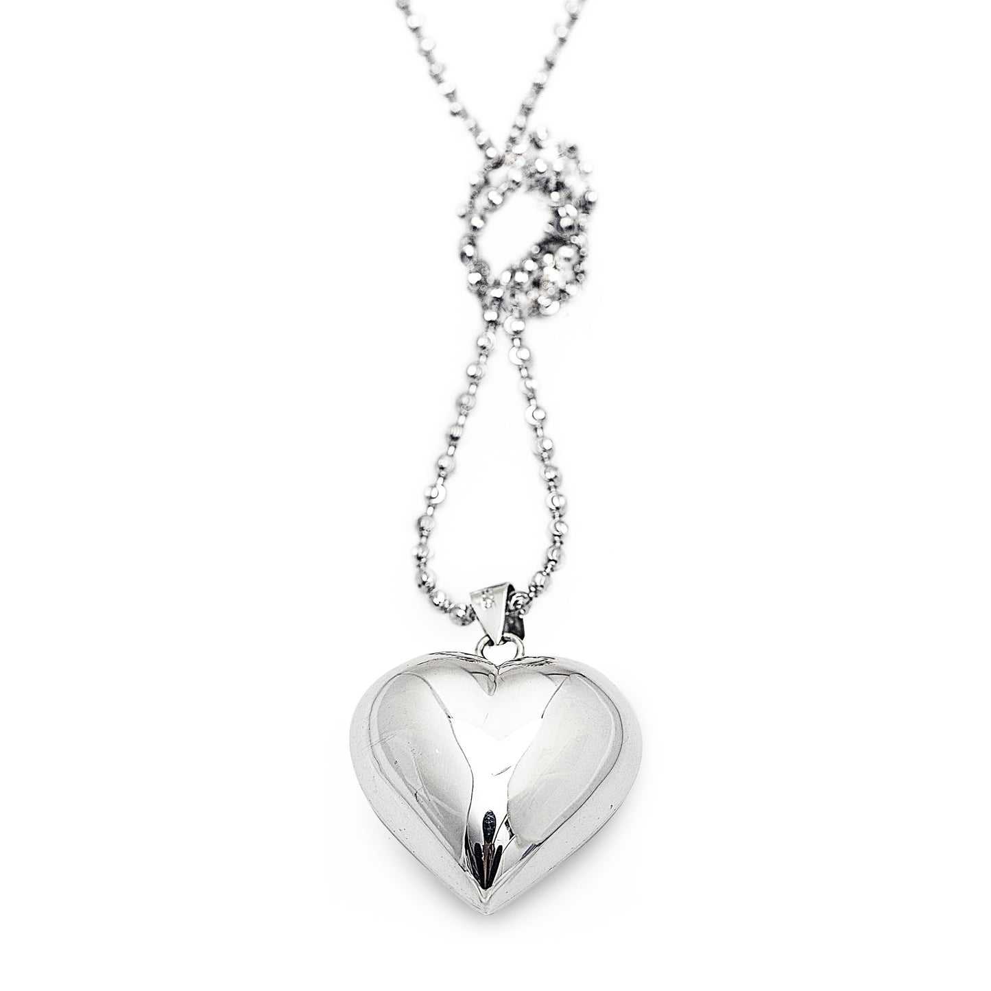 Summer Love Necklace in 925 sterling silver with a large heart pendant with chime. Worldwide shipping. Affordable luxury jewellery by Bellagio & Co.