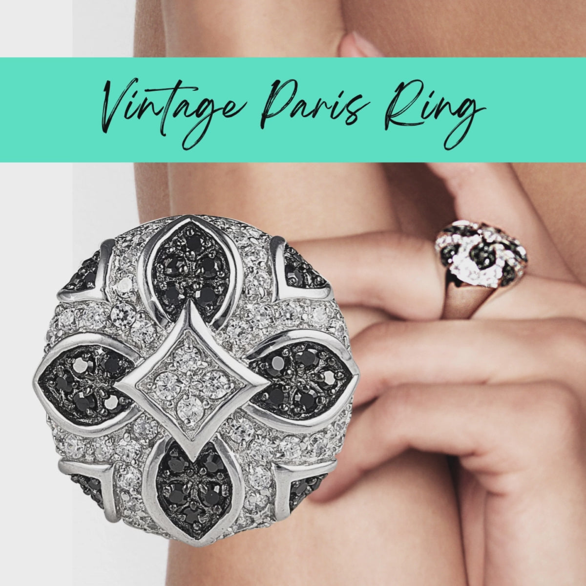 A Parisian work of art - this 925 Sterling Silver ring features a vintage geometric design dripping with black and clear facet cut Cubic Zirconia stones. Worldwide shipping.