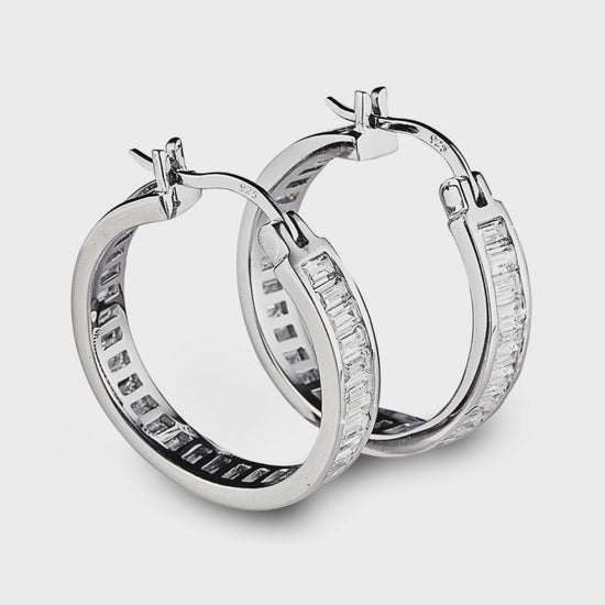 Glamorous Large Charlotte Hoop Earrings in 925 sterling silver with baguette-cut cubic zirconia stones. Approx 28mm in diameter. Add instant elegance to any look. Worldwide shipping + FREE shipping within Australia ($150+ spend)