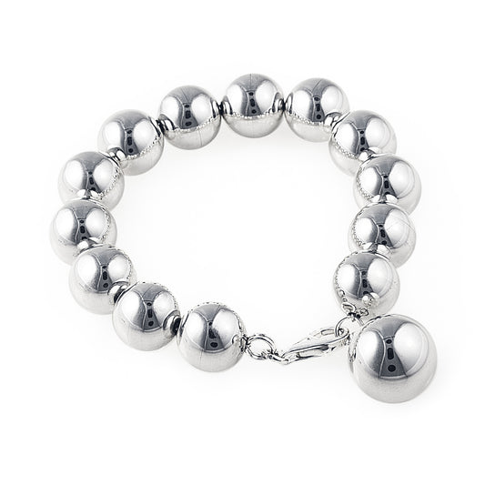 The beautiful Audrey Ball Bracelet in 925 sterling silver features 15mm diameter balls threaded onto a sturdy chain with a large silver ball charm. It's a modern and elegant take on a classic pearl bracelet. Luxury jewellery by Bellagio & Co. Worldwide Shipping plus FREE shipping for orders over $150 in Australia.