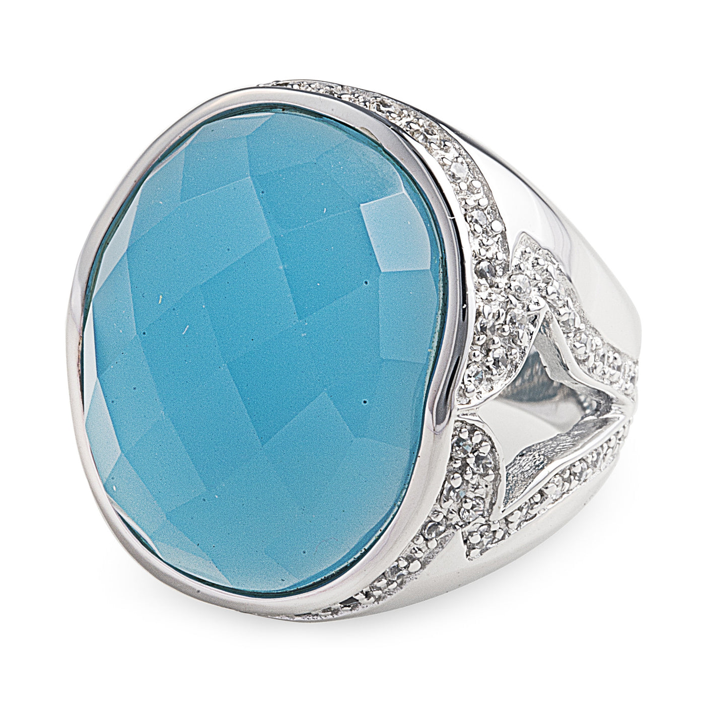 The Sky Blue Lopez Ring is made of 925 sterling silver featuring a beautiful side pattern encrusted with cubic zirconia stones that hold in place a stunning facet cut Milky Blue Obsidian that grabs lots of attention. Worldwide Shipping. Jewellery by Bellagio & Co.